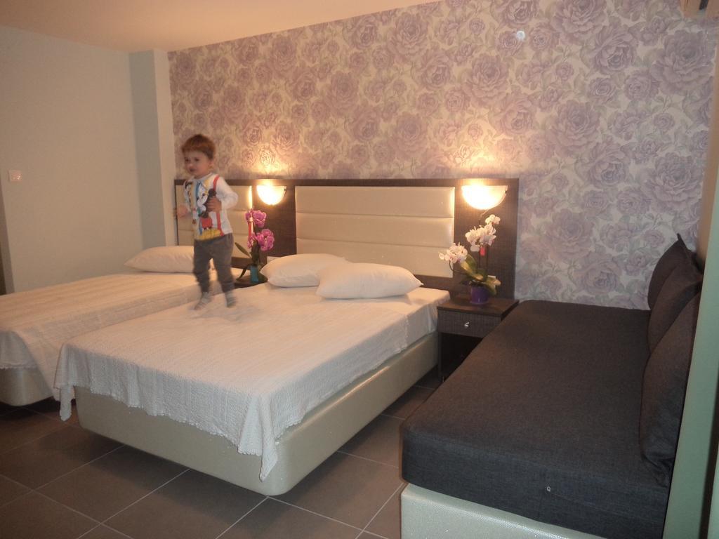 Hotel Dioni Paralía Pokoj fotografie