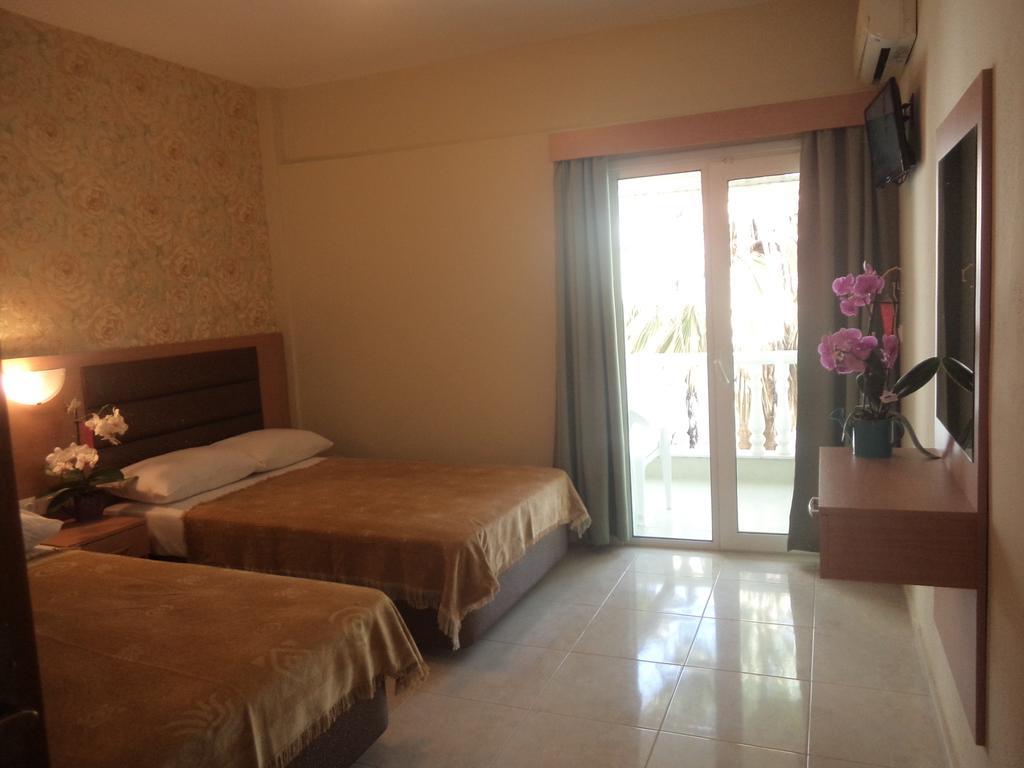 Hotel Dioni Paralía Pokoj fotografie