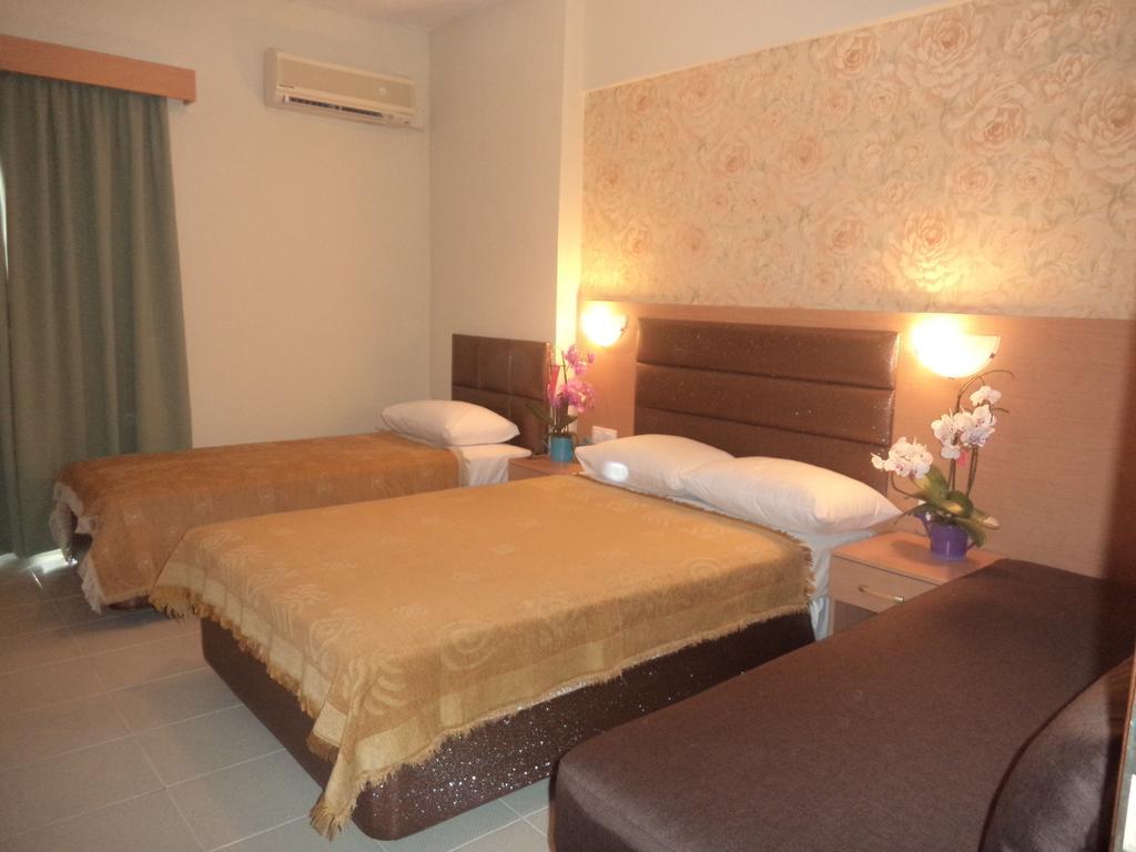 Hotel Dioni Paralía Pokoj fotografie